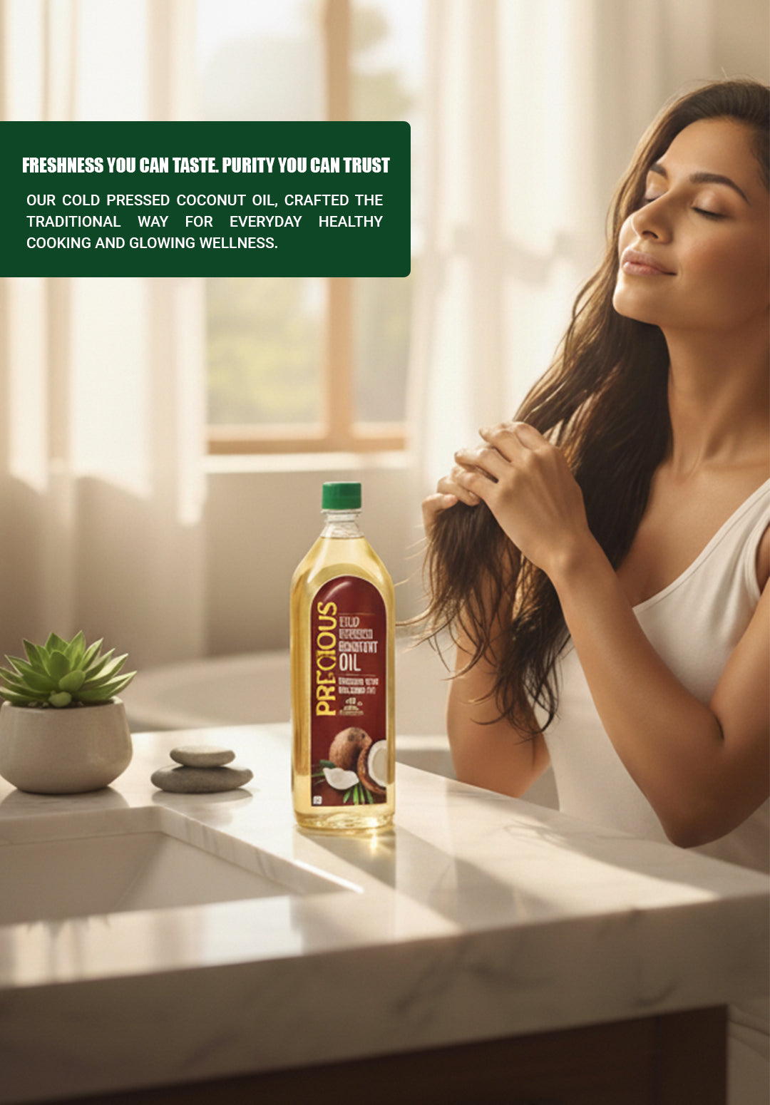 Woman with a bottle of precious coconut oil in massaging her head and applying oil to her hair 