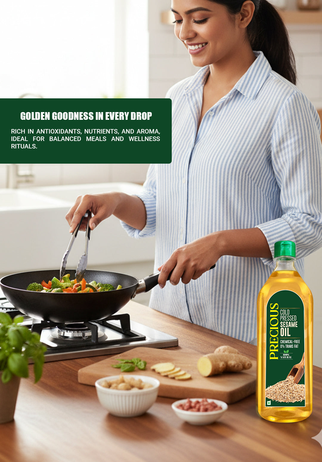 Woman cooking with a bottle of precious cold pressed  cooking oil on a kitchen counter