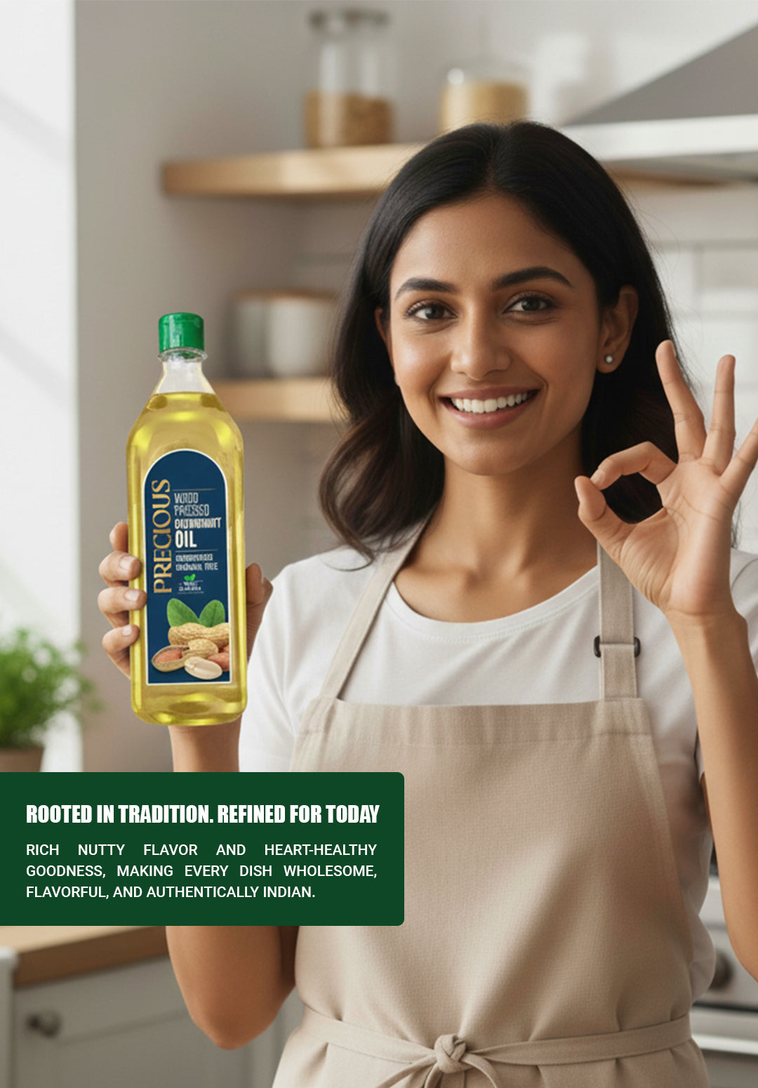 Woman holding a bottle of precious cold pressed groundnut oil in a kitchen setting for mobile responsive edition