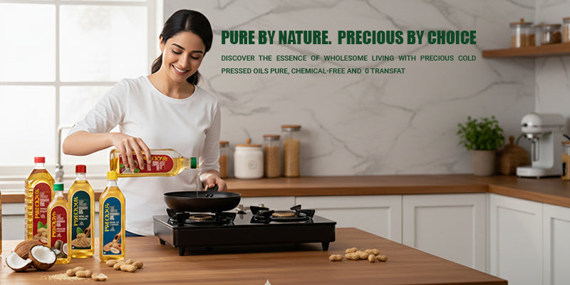 Woman cooking with the range of precious cold pressed cooking oil in a kitchen, with text about pure and precious oils.
